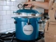 All American 921 pressure canner heating on stove