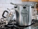 All American 930 pressure canner showing lid and regulator